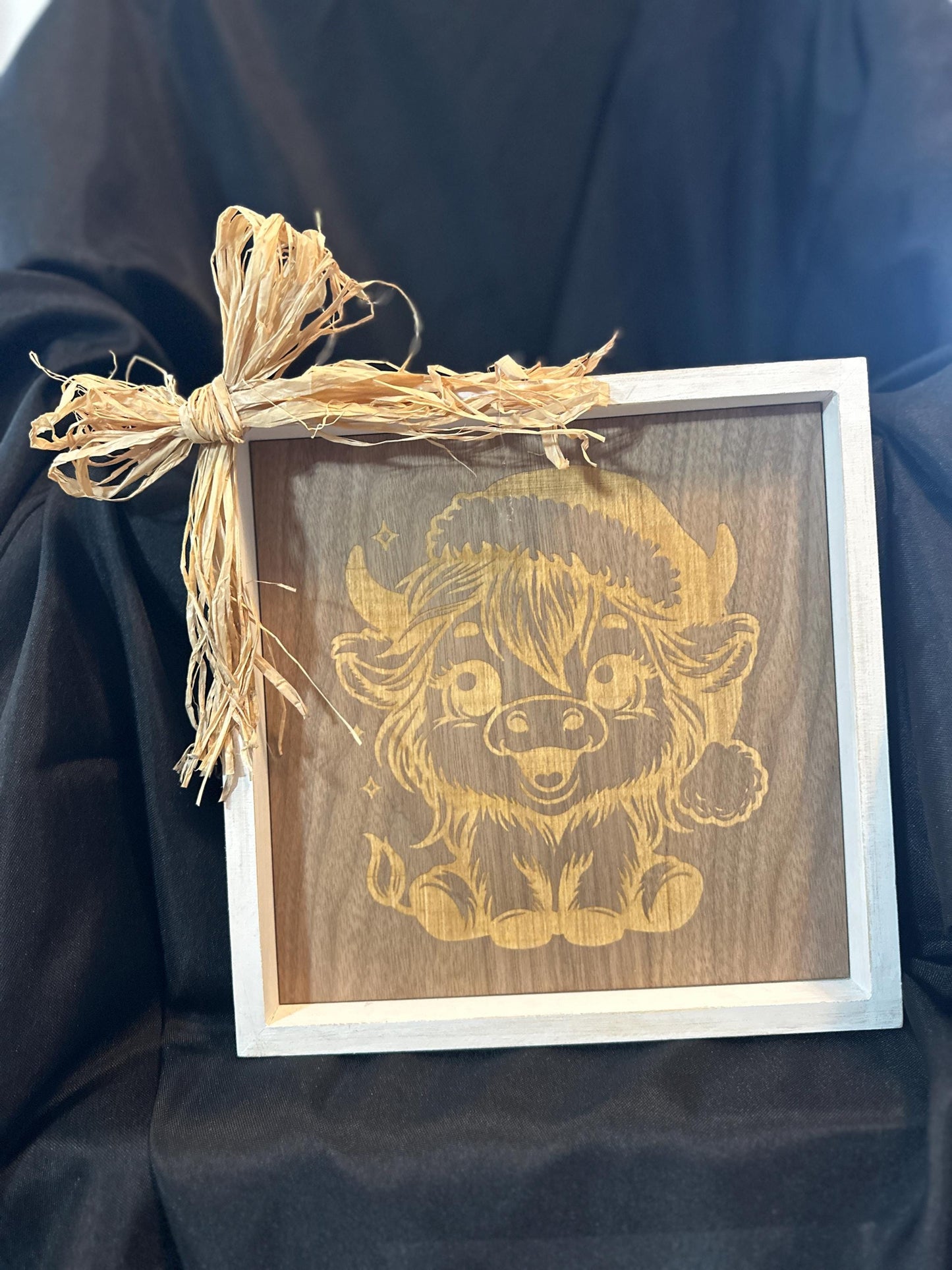 10X10 white picture frame with engraved on walnut long haired baby cow with Christmas hat and straw bow