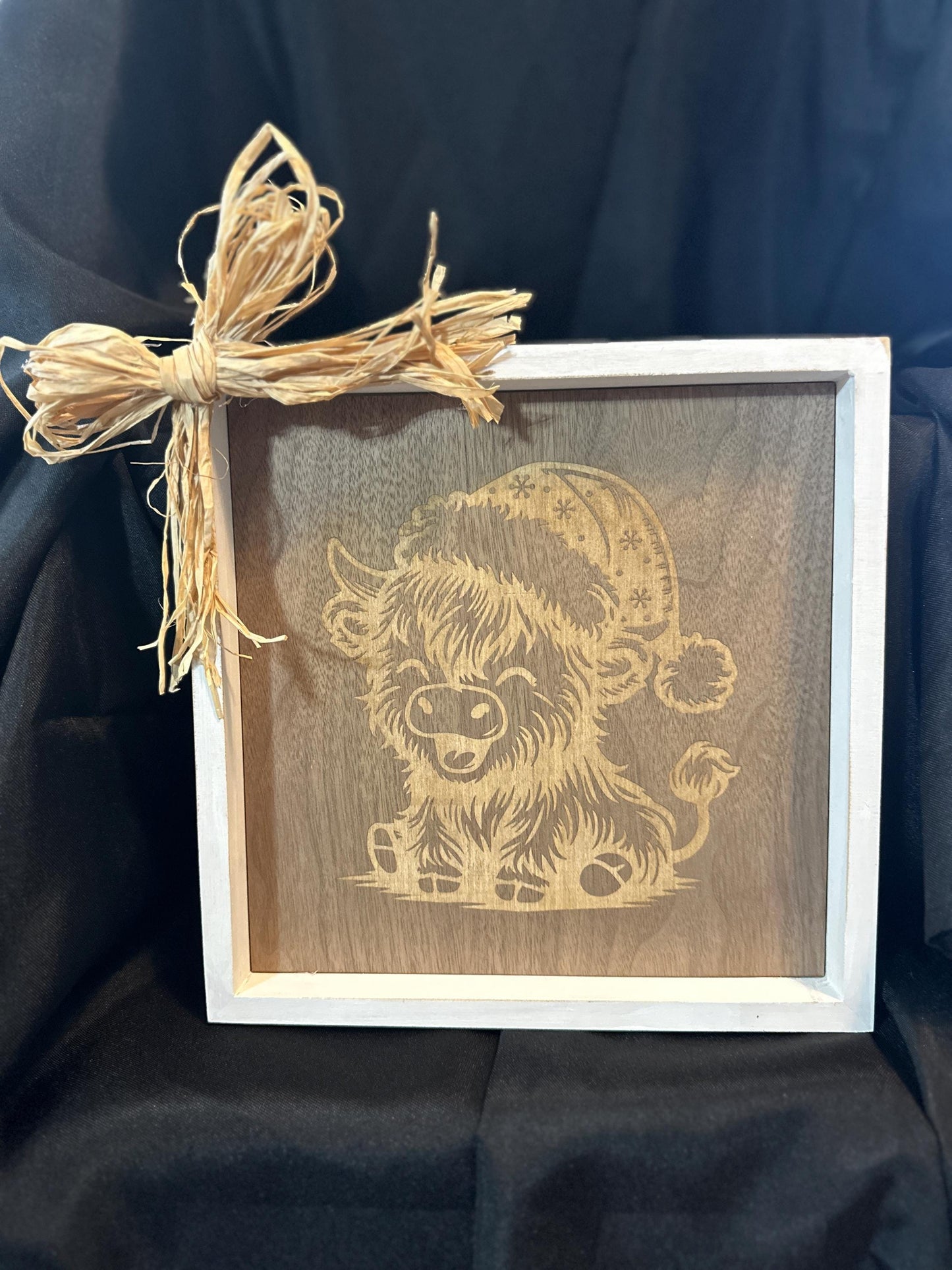 10X10 white picture frame with engraved on walnut long haired baby cow with Christmas hat and straw bow