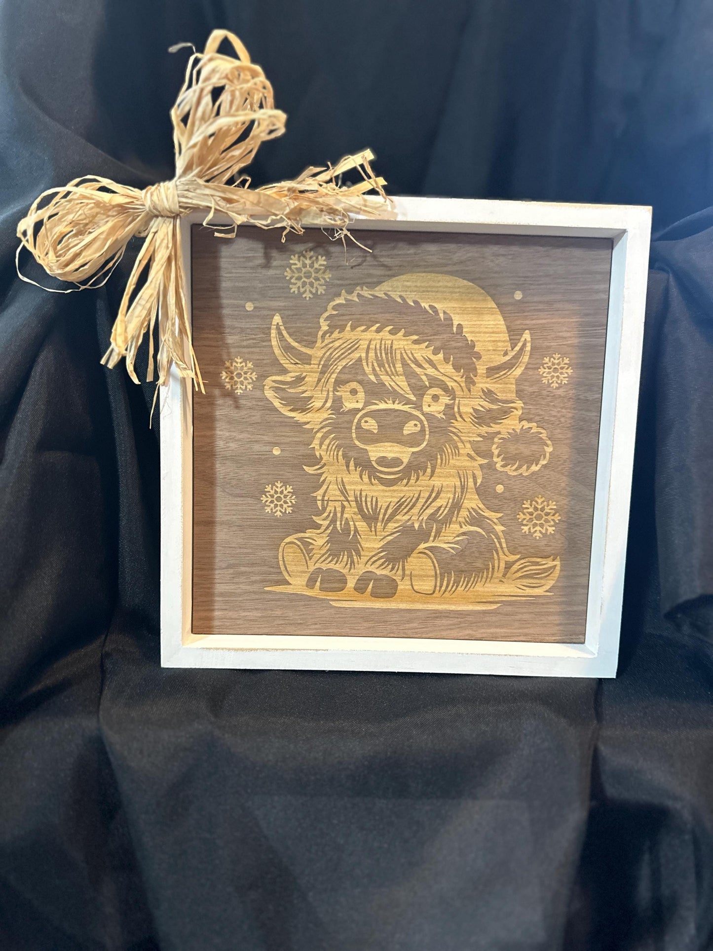 10X10 white picture frame with engraved on walnut long haired baby cow with Christmas hat and straw bow