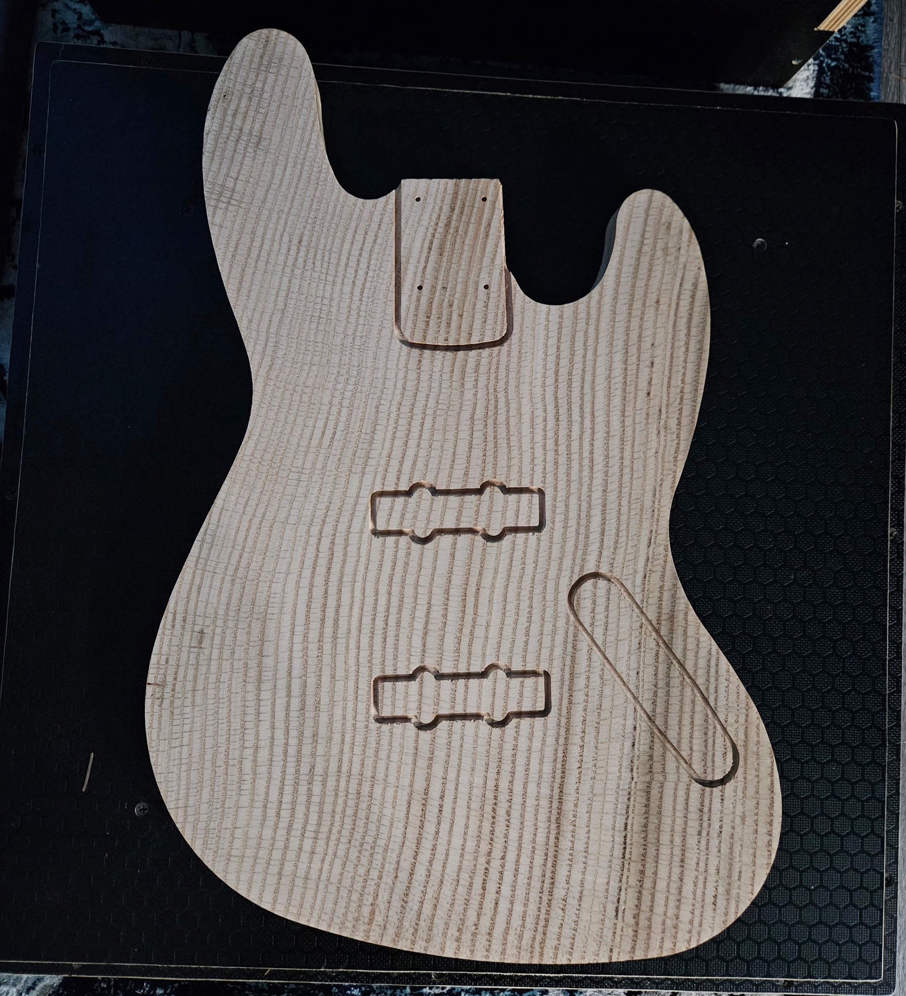 White oak cutout of guitar body