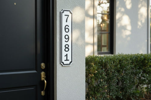 Custom 2-inch vertical HDPE address sign mounted beside a front door