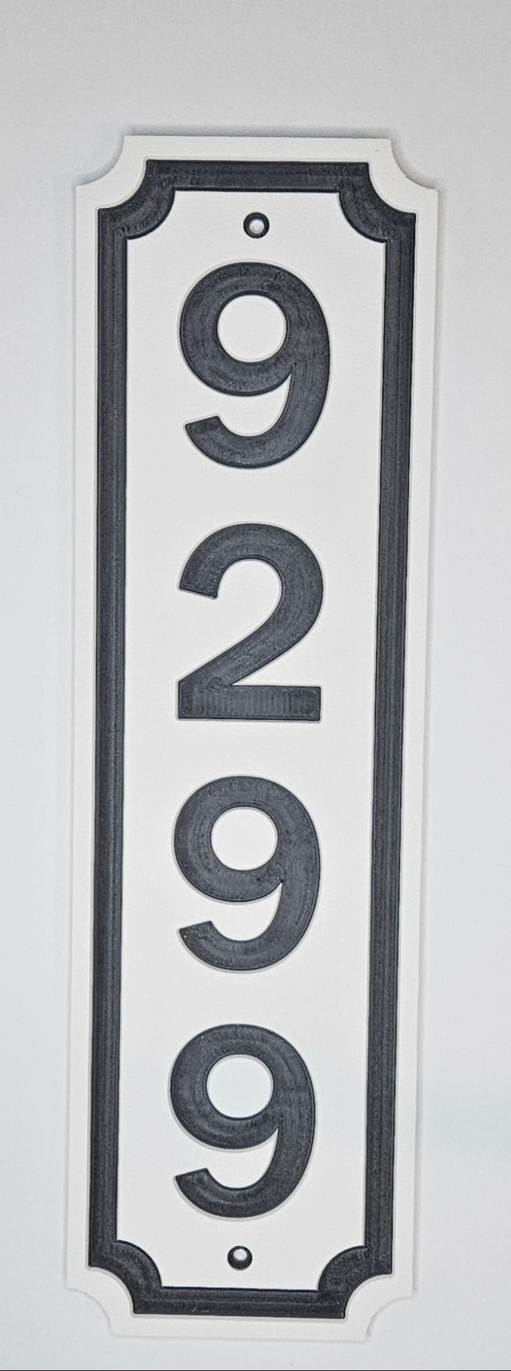 Black and white custom vertical HDPE address sign with 2-inch numbers