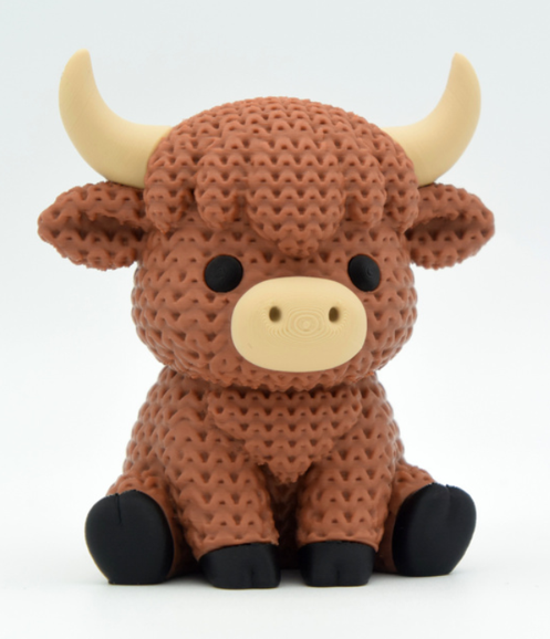3d printed "knitted" style highland cow bull with brown fur, black hooves, and tan horns on a white background
