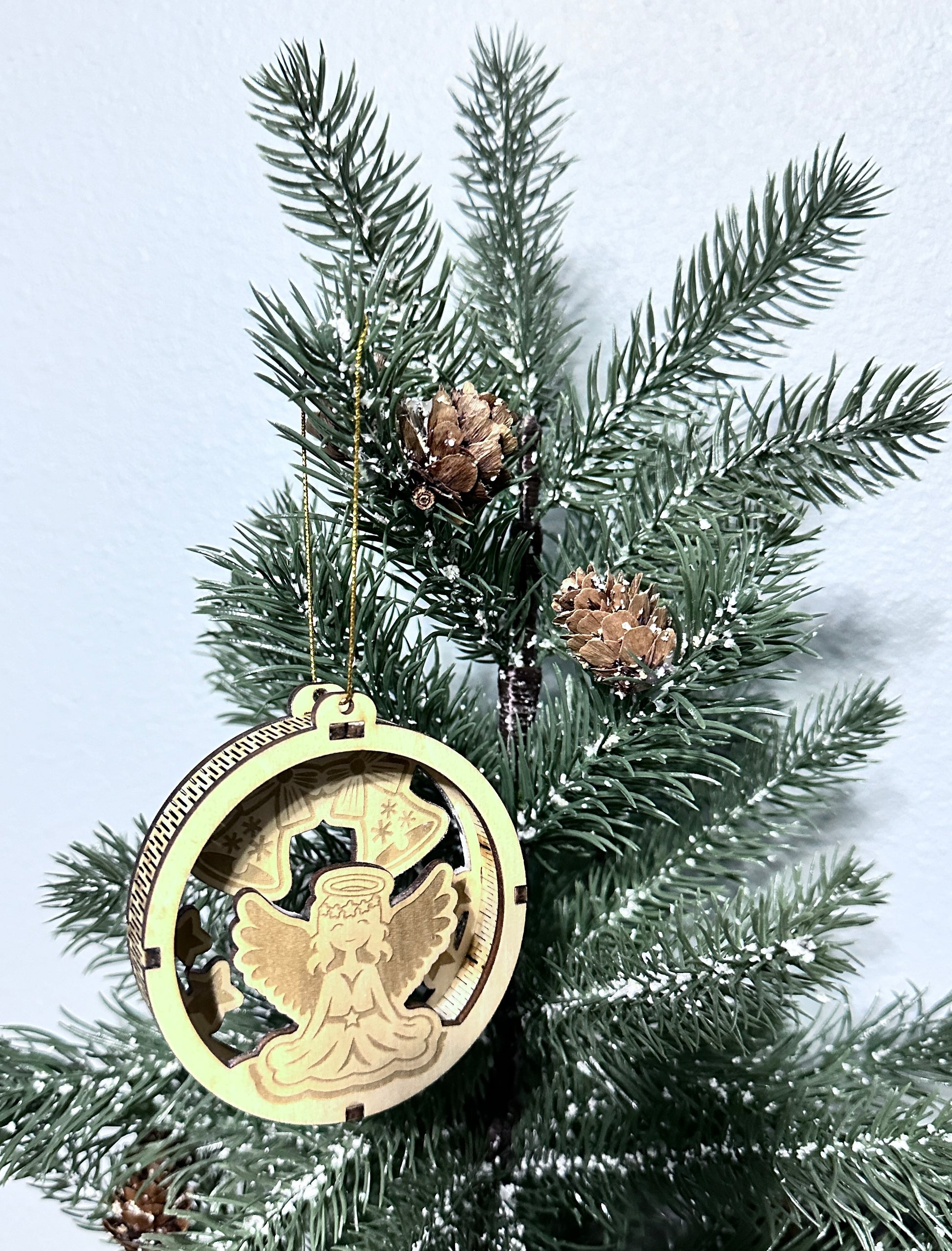 Close up 3d wooden ornament with sitting angel.