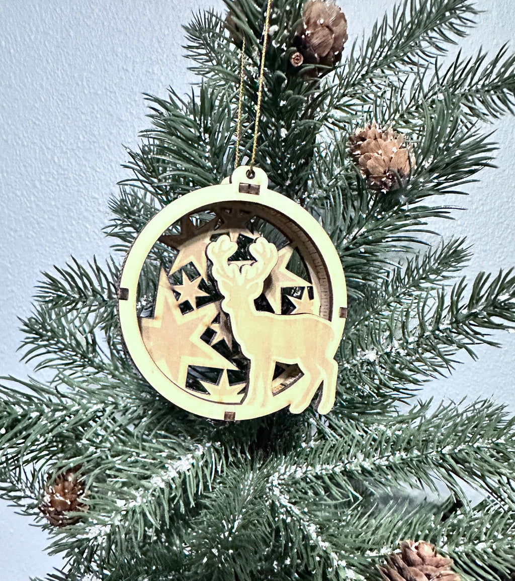 Close-up 3d wooden ornament with deer and stars.