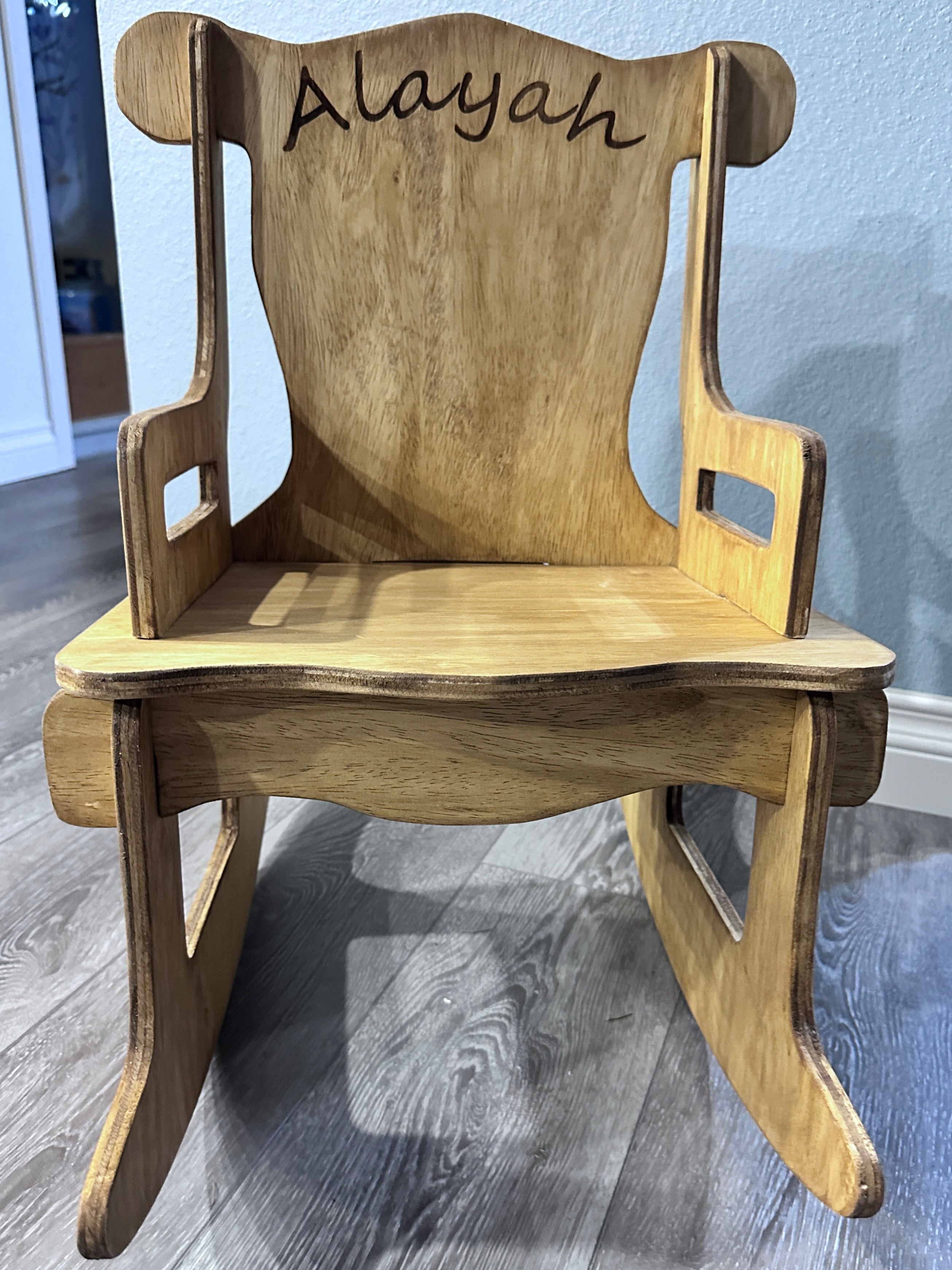 Toddler rocking chair with Alayah engraved on the back