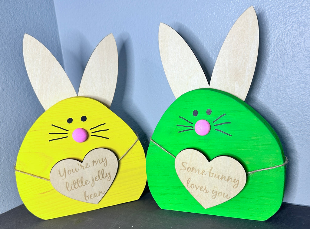 Yellow and Green painted wooden easter bunny heads with light wood ears and hearts with cute Easter sayings