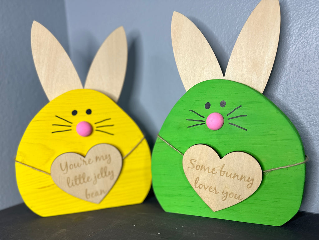Yellow and Green painted wooden easter bunny heads with light wood ears and hearts with cute Easter sayings