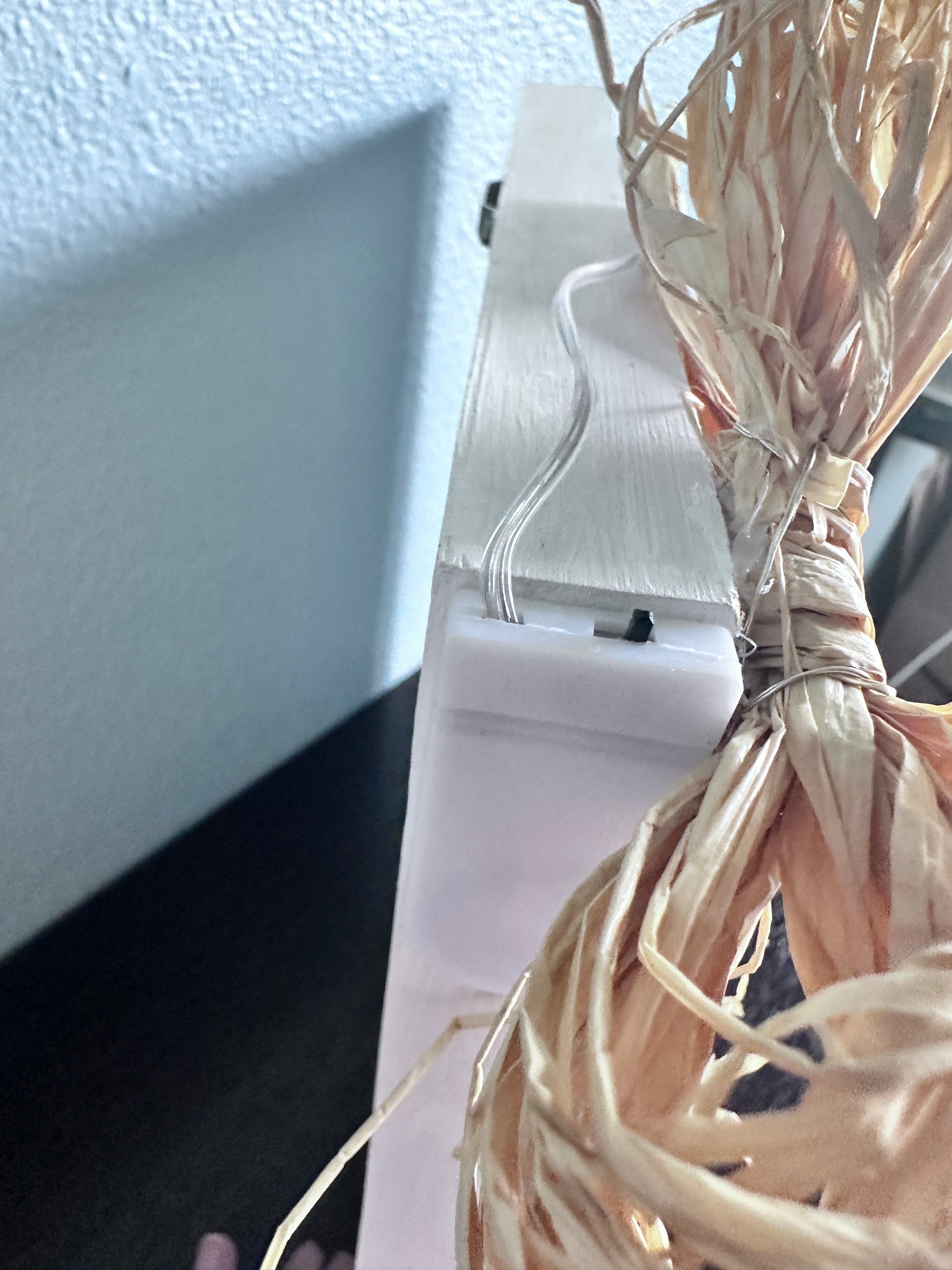 Easy access to side battery compartment on frame behind straw bow