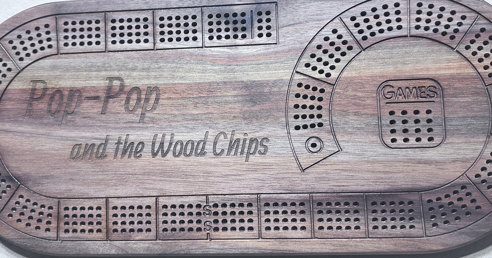 Oval 4 player hardwood cribbage board with engraved saying