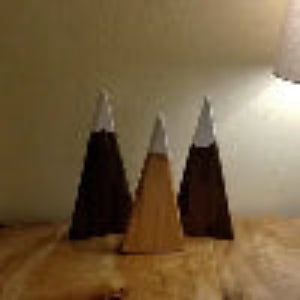 Customer shared image of 3 hardwood mountains with snowcaps as home decor