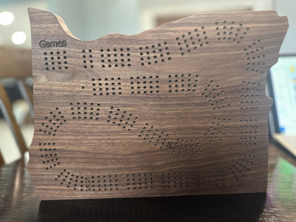 Dark walnut 4player cribbage board state of Oregon shape