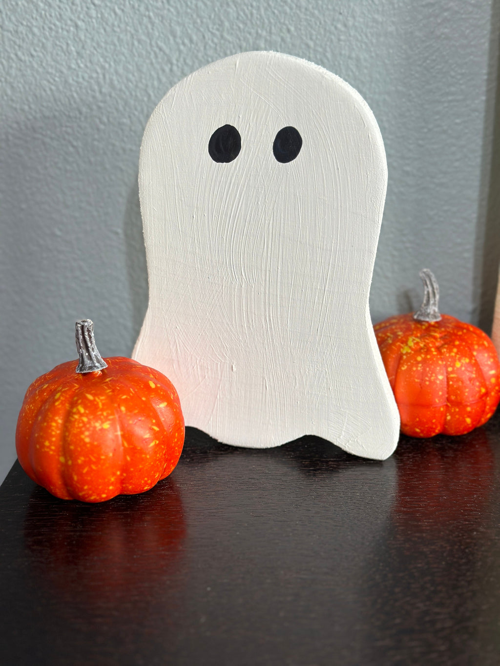 wooden ghost with no mouth pumpkins