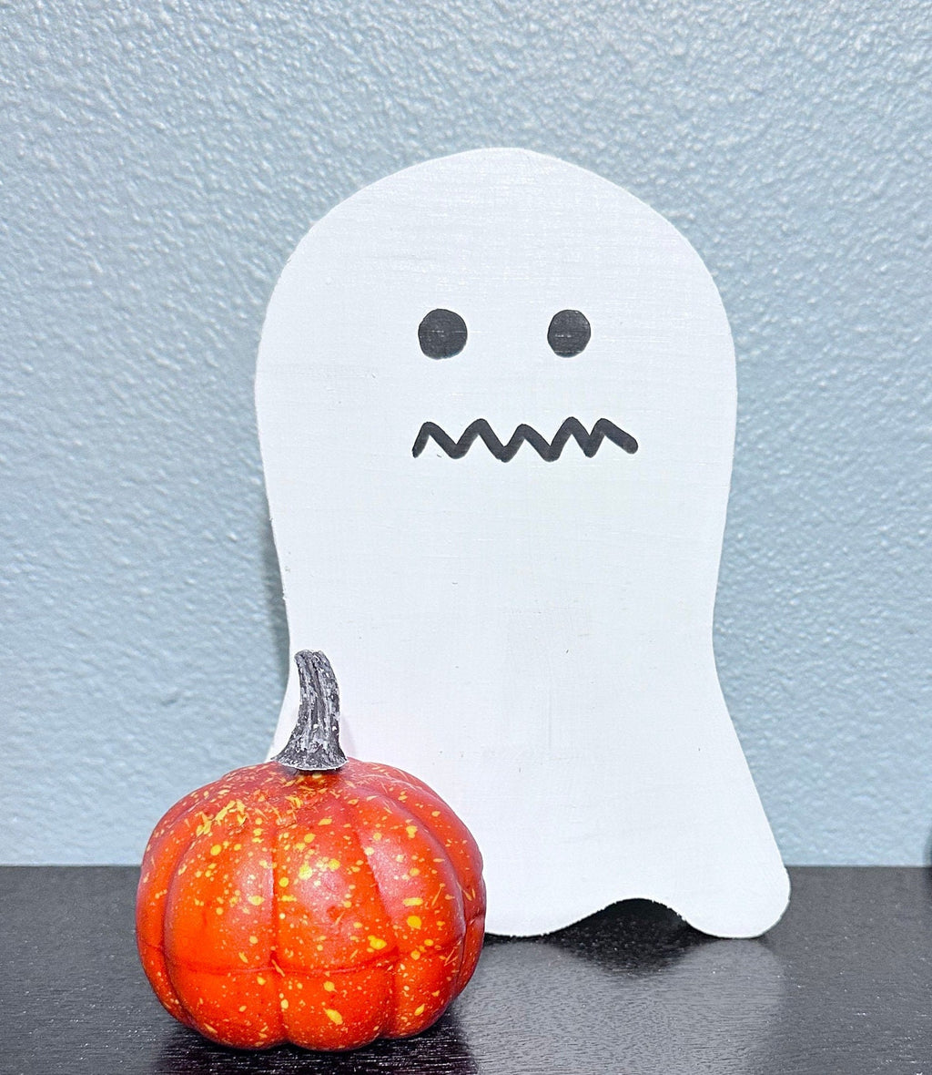Wooden Ghost with scared mouth and pumpkin