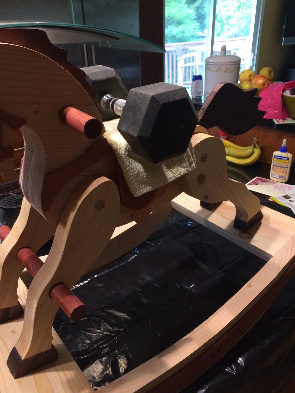 partially assembled custom made antique style wooden rocking horse