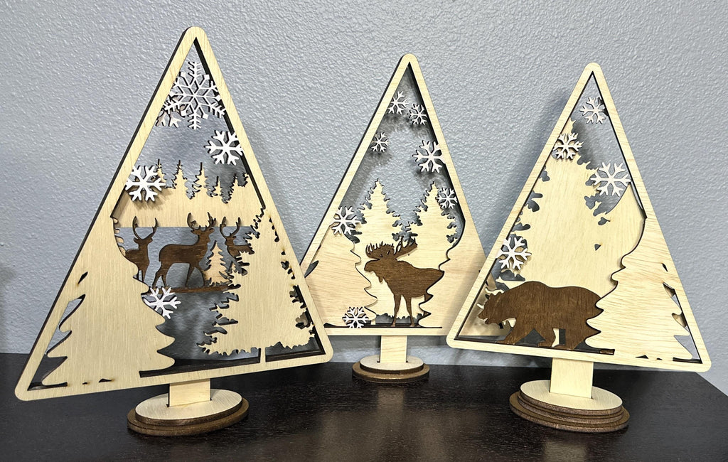 3 Wood layered triangle decor with deer, moose and bear stained centers with tree and white painted snowflake accents