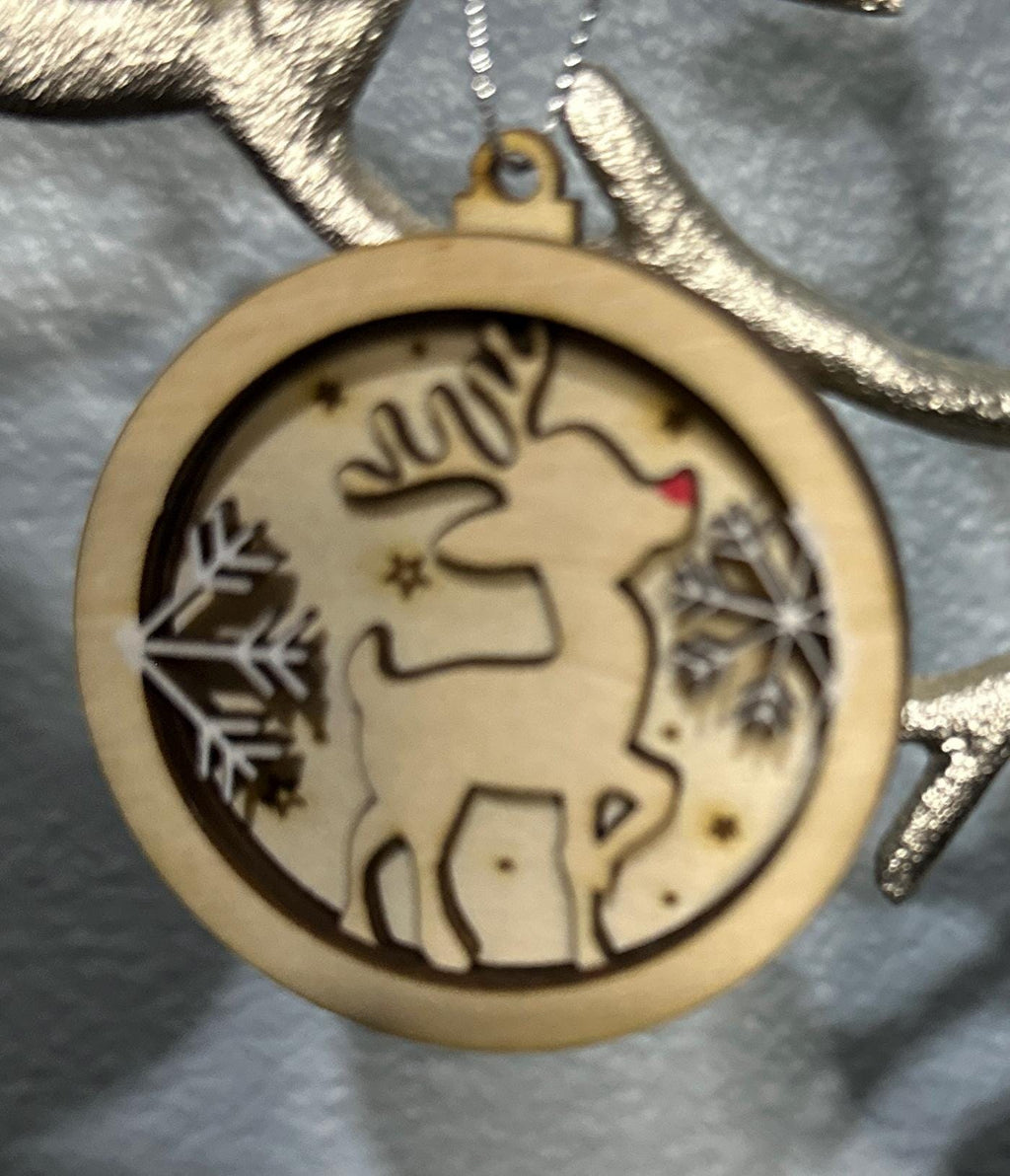 Zoomed in view of Rudolph with white snowflakes